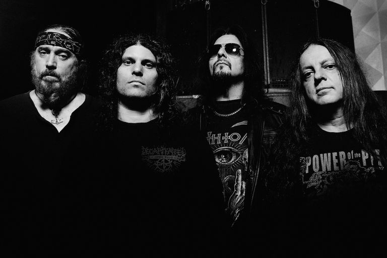 Black and white promo photo of death metal tribute band Death To All featuring musicians Gene Hoglan, Max Phelps, Steve Di Giorgio, and Bobby Koelble.